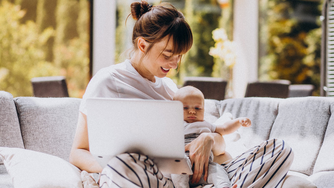 A mother gently holding her premature baby, representing the bonding and care supported by the resources listed in this guide.